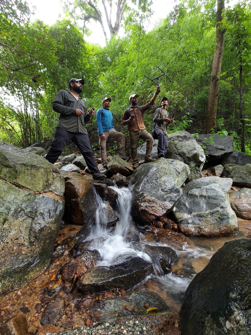 Wct Research Team Monitoring Released Pangolin in the Field During Monsoon